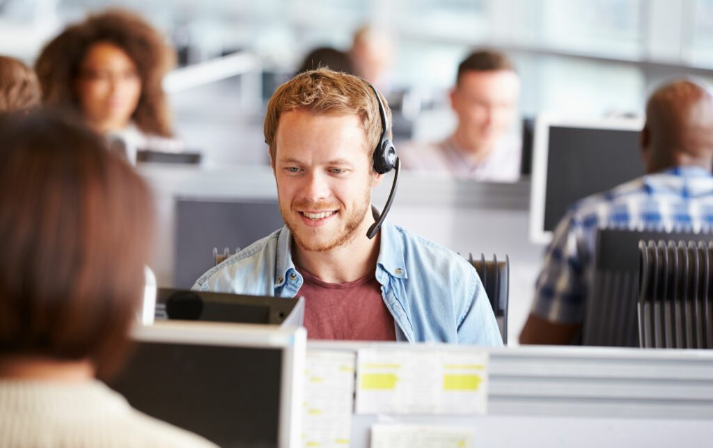 cell-vs-voip-man-in-call-center-using-voip-over-cell
