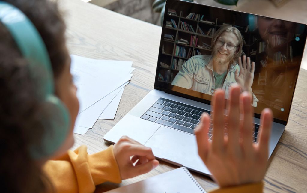two students talking via pc calling